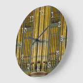 Rote und goldene Orgelpfeifen rund um die Uhr (Winkel)