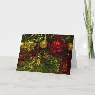 Rote und goldene Weihnachtsschmuck Rotes Gold auf  Feiertagskarte