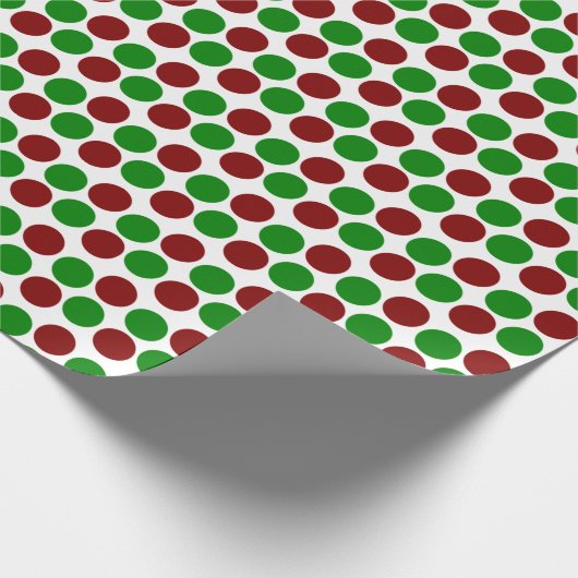 Rote und grüne Urlaubspunkte auf Weiß Geschenkpapier (Ecke)