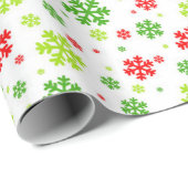 Rote und grüne Weihnachtsschneeflocken Geschenkpapier (Rolleneckpunkt)