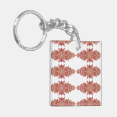 Rote und orangefarbene Blütengestaltung mit Ziergr Schlüsselanhänger (Vorderseite links)