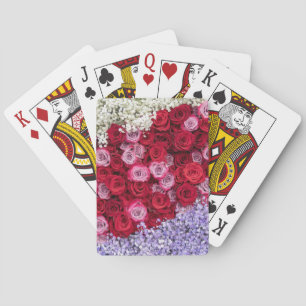 Rote und rosa Rosen mit farbenfroher Gypsophila Spielkarten