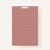 Rote und rosa Textilien auf einem gemusterten Tepp Ausweis (Rückseite)