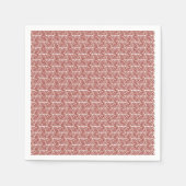Rote und rosa Textilien auf einem gemusterten Tepp Serviette (Vorderseite)