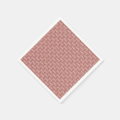 Rote und rosa Textilien auf einem gemusterten Tepp Serviette (Ecke)