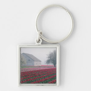 Rote und rosa Tulpen heißen den Tag auf einem Mis Schlüsselanhänger