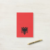 Rote und schwarze doppelte vorangegangene post-it klebezettel (Auf Schreibtisch)