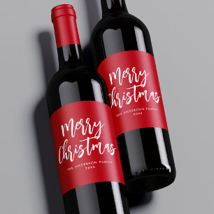Rote und weiße Pinselschrift Frohe Weihnachten Weinetikett