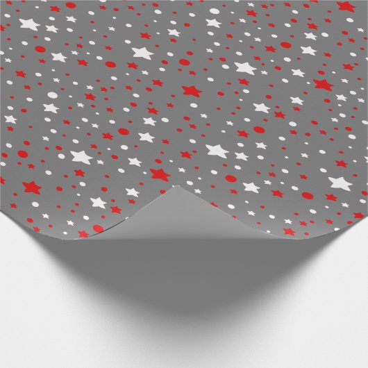Rote und weiße Sterne auf grauem Umschlagpapier Geschenkpapier (Ecke)