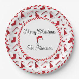 Rote und weiße Weihnachtsmannmützen und Süßspeisen Pappteller