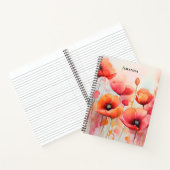 Rote Wasserfarben in einem Feld Notizblock (Innenseite)