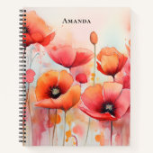 Rote Wasserfarben in einem Feld Notizblock (Vorderseite)