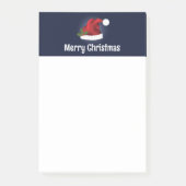 Rote Weihnachtsmannmütze mit Weihnachtsholz und in Post-it Klebezettel (Vorderseite)