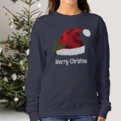 Rote Weihnachtsmannmütze mit Weihnachtsholz und in Sweatshirt