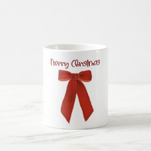 Rote Weihnachtsschleife mit Frohe Weihnachten Text Kaffeetasse