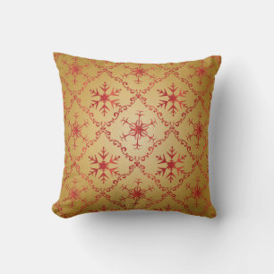 Rote Weihnachtsstars auf Gold Kissen