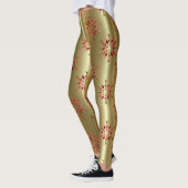 Rote Weihnachtsstars auf Gold Leggings (Links)