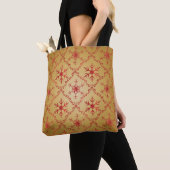 Rote Weihnachtsstars auf Gold Tasche (Von Nahem)