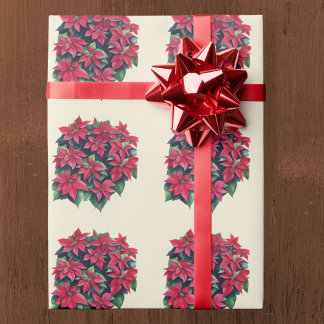 Rote Weihnachtsstern-Christmas-Blume auf hellgelb Geschenkpapier