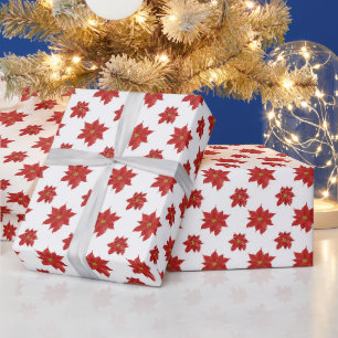 Rote Weihnachtssterne auf Weiß Geschenkpapier