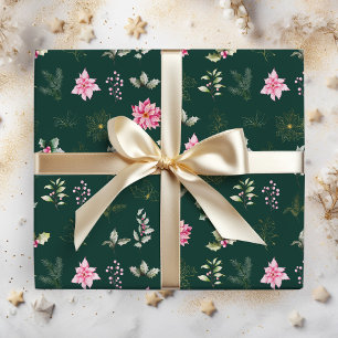 Rote Weihnachtssterne-Blüten und Blätter auf dunke Geschenkpapier
