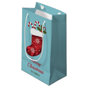 Rote Weihnachtsstrumpf auf Blau mit individuellem  Kleine Geschenktüte