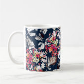Rote, weiße Blume auf blau. Kaffeetasse (Links)