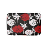 Rote, weiße Blume auf schwarz. Badematte (Vorderseite)