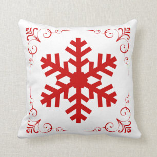 Rote Winter-Schneeflocke mit festlichem Kissen