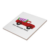 Roter antiker Lieferwagen-LKW und riesige Fliese (Seite)