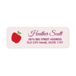 Roter Apfel auf Rosa