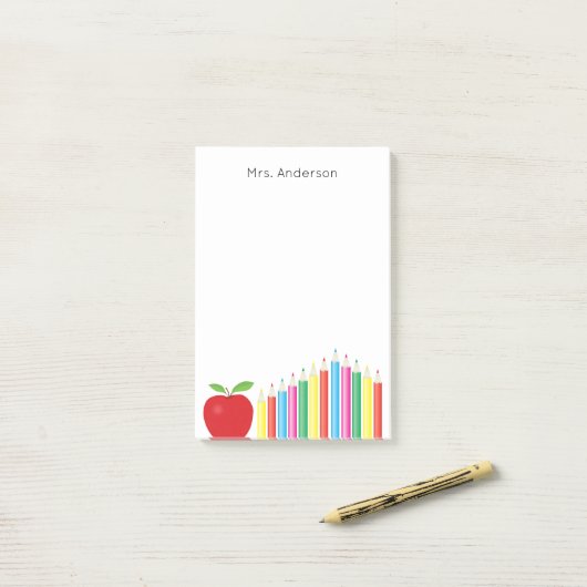 Roter Apple und farbiger Bleistift-Lehrer Post-it Klebezettel (Auf Schreibtisch)