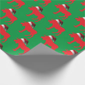 Roter Elch mit einer Weihnachtsmannmütze Geschenkpapier (Ecke)