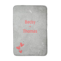 Roter Graffiti-Name auf grauem Beton, Ihr