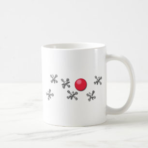 Roter Gummiball und Jacke Kaffeetasse
