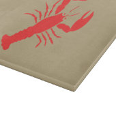 Roter Hummer auf Khaki Schneidebrett (Ecke)