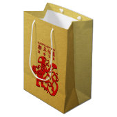 Roter Hundejahr-Chinese Papercut goldene M Mittlere Geschenktüte (Vorderseite Schrägansicht)
