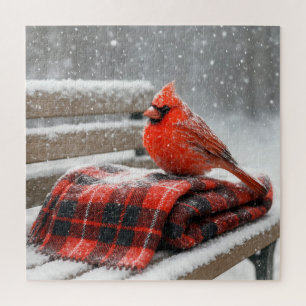 Roter Kardinal auf einer schneebedeckten karierten Puzzle