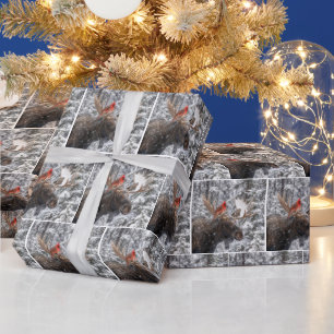 Roter Kardinal auf schneebedecktem Elchgeweih zu W Geschenkpapier