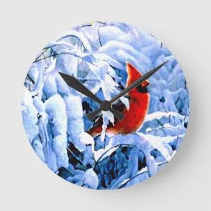 Roter Kardinal im Winterschnee Runde Wanduhr