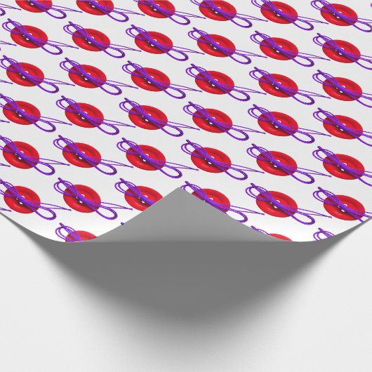 roter Knopf mit lila Bogen Geschenkpapier (Ecke)