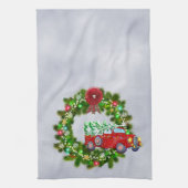 Roter Lkw, der durch einen Weihnachtskranz fährt Geschirrtuch (Vertikal)