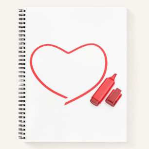 Roter Marker und rotes Herz Notizblock