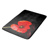 Roter Mohn aus Single auf schwarz Badematte (Schrägansicht)