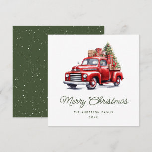 Roter Pick-up-Truck präsentiert grünen Weihnachtsb Feiertagskarte