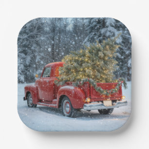 Roter Retro-LKW mit Weihnachtsbaum in Schneeflocke Pappteller