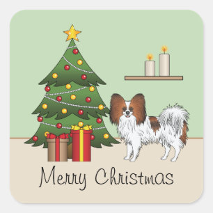 Roter Sable-Papillon-Hund neben einem Weihnachtsba Quadratischer Aufkleber