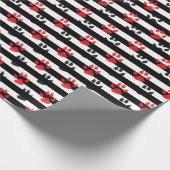 Roter schwarzer Klauen auf Schwarz-weißen Streifen Geschenkpapier (Ecke)