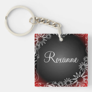 Roter schwarzer mit BlumenSchlüsselanhänger des Schlüsselanhänger