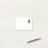 Roter Spielzeugroboter mit Hello-Schild Post-it Klebezettel (Auf Schreibtisch)